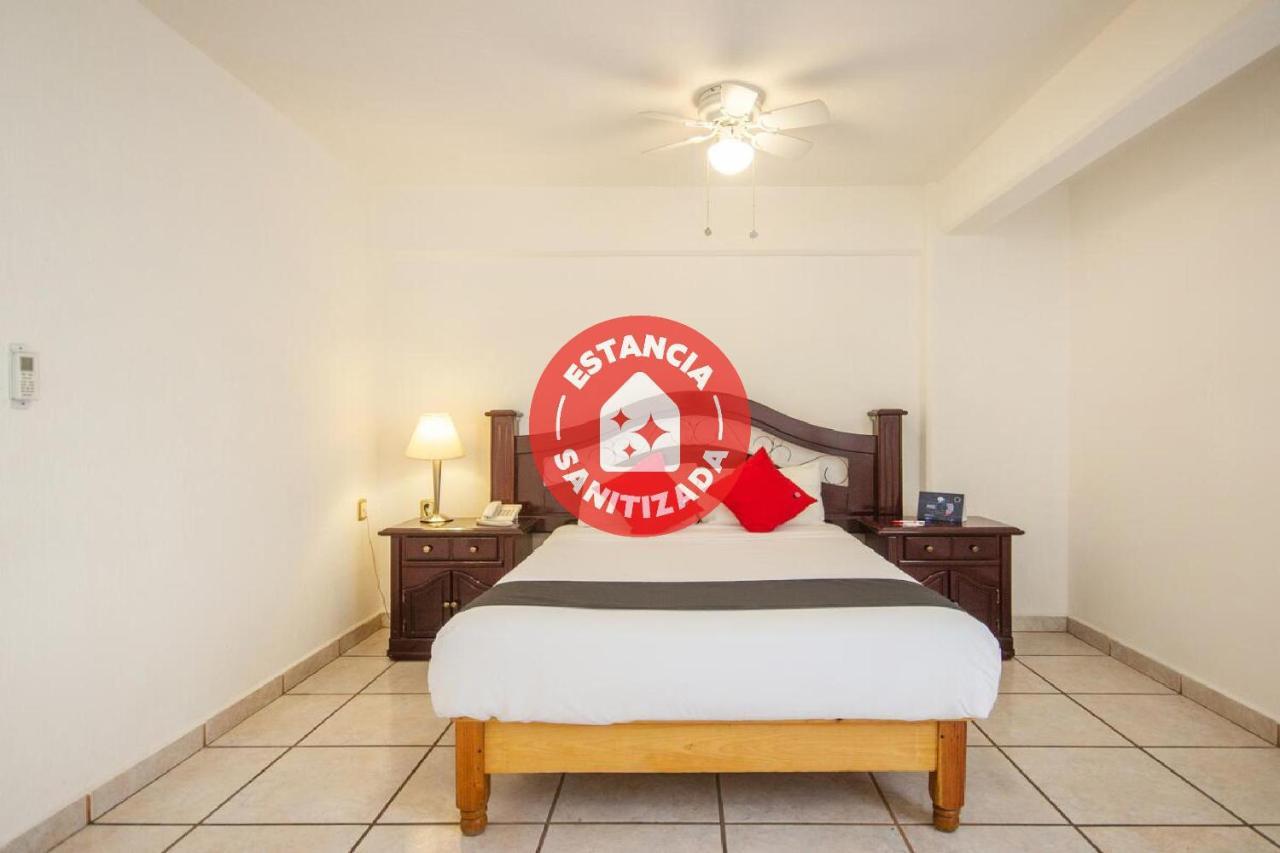 Capital O Hotel Suites Andrade ليون المظهر الخارجي الصورة
