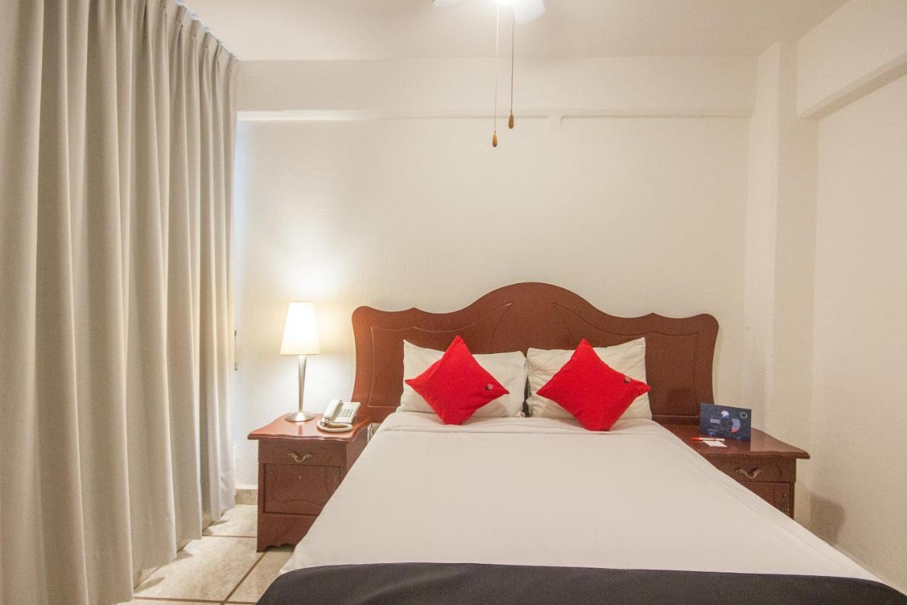 Capital O Hotel Suites Andrade ليون المظهر الخارجي الصورة