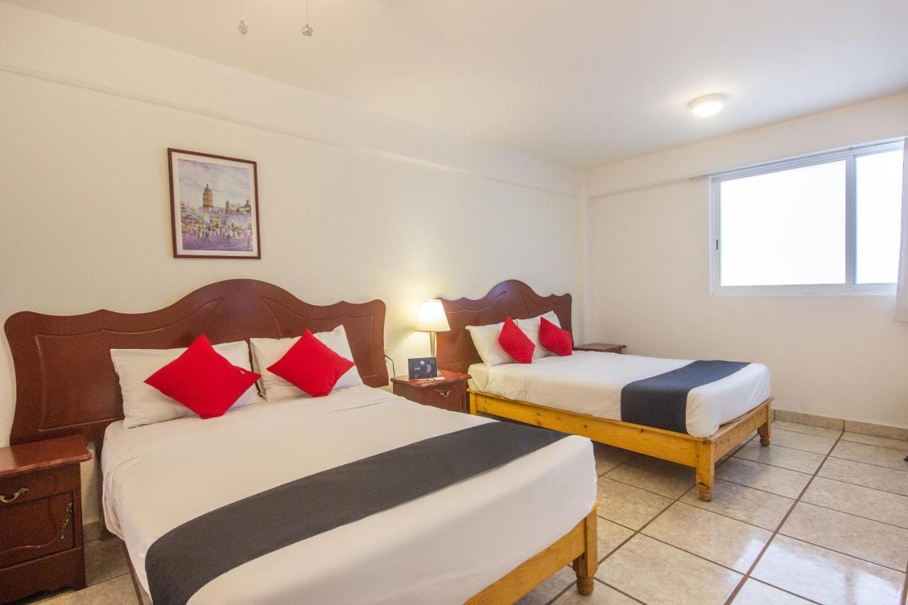 Capital O Hotel Suites Andrade ليون المظهر الخارجي الصورة