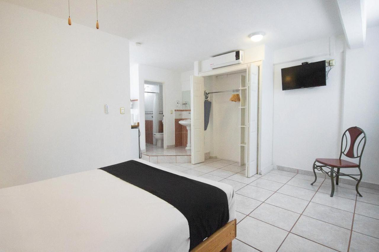 Capital O Hotel Suites Andrade ليون المظهر الخارجي الصورة