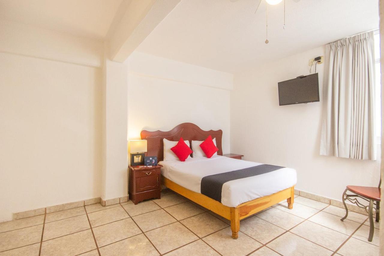 Capital O Hotel Suites Andrade ليون المظهر الخارجي الصورة