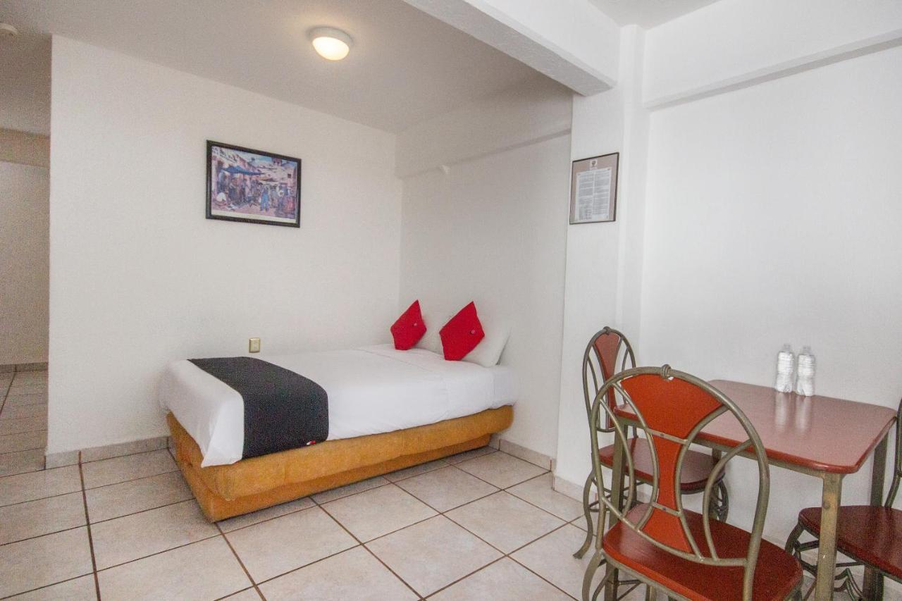 Capital O Hotel Suites Andrade ليون المظهر الخارجي الصورة