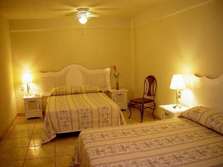 Capital O Hotel Suites Andrade ليون المظهر الخارجي الصورة