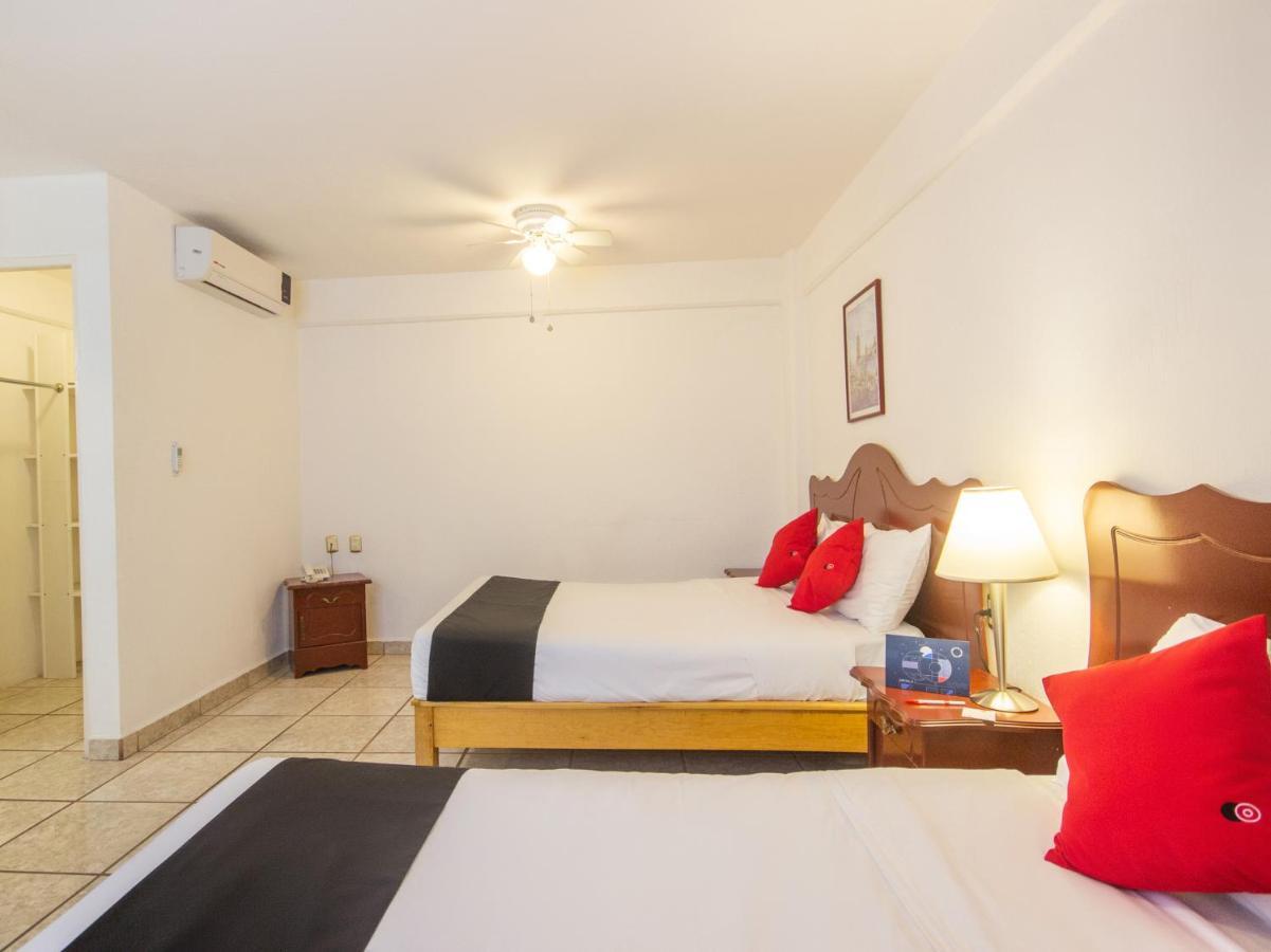 Capital O Hotel Suites Andrade ليون المظهر الخارجي الصورة