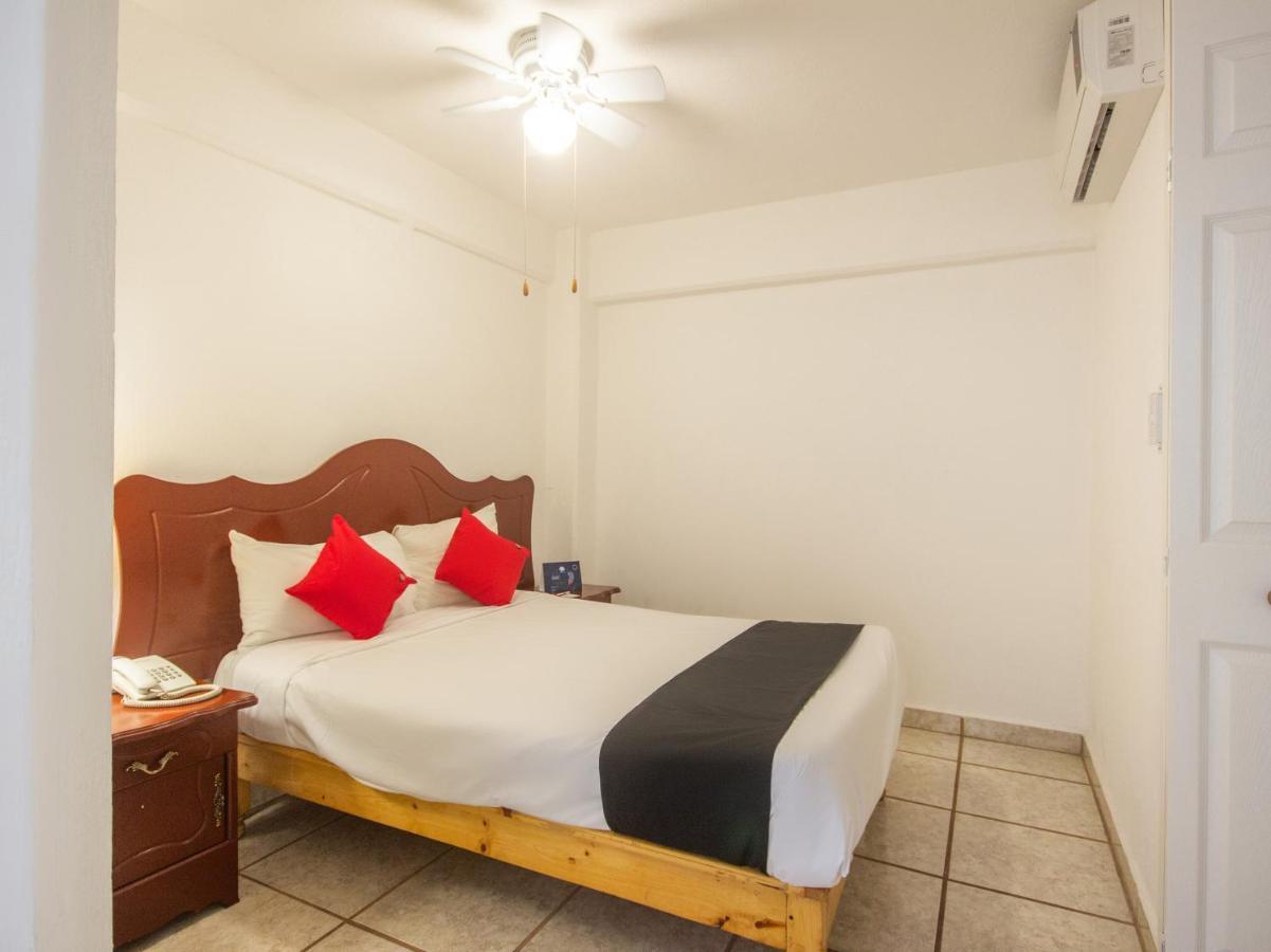 Capital O Hotel Suites Andrade ليون المظهر الخارجي الصورة
