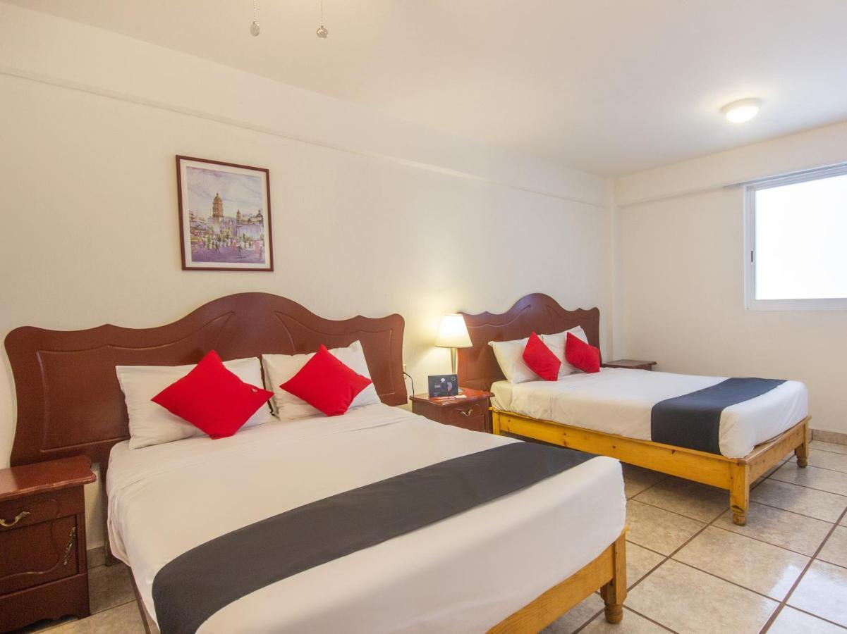 Capital O Hotel Suites Andrade ليون المظهر الخارجي الصورة