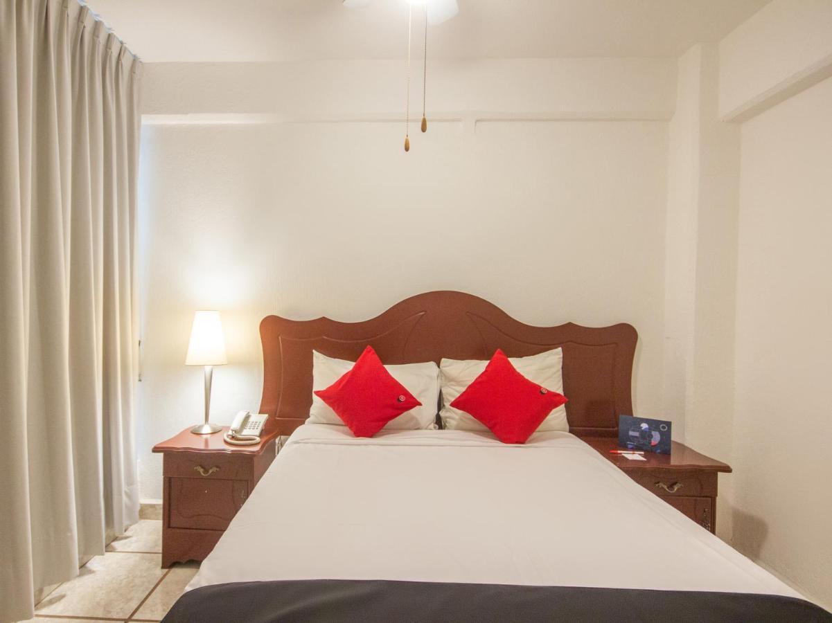 Capital O Hotel Suites Andrade ليون المظهر الخارجي الصورة