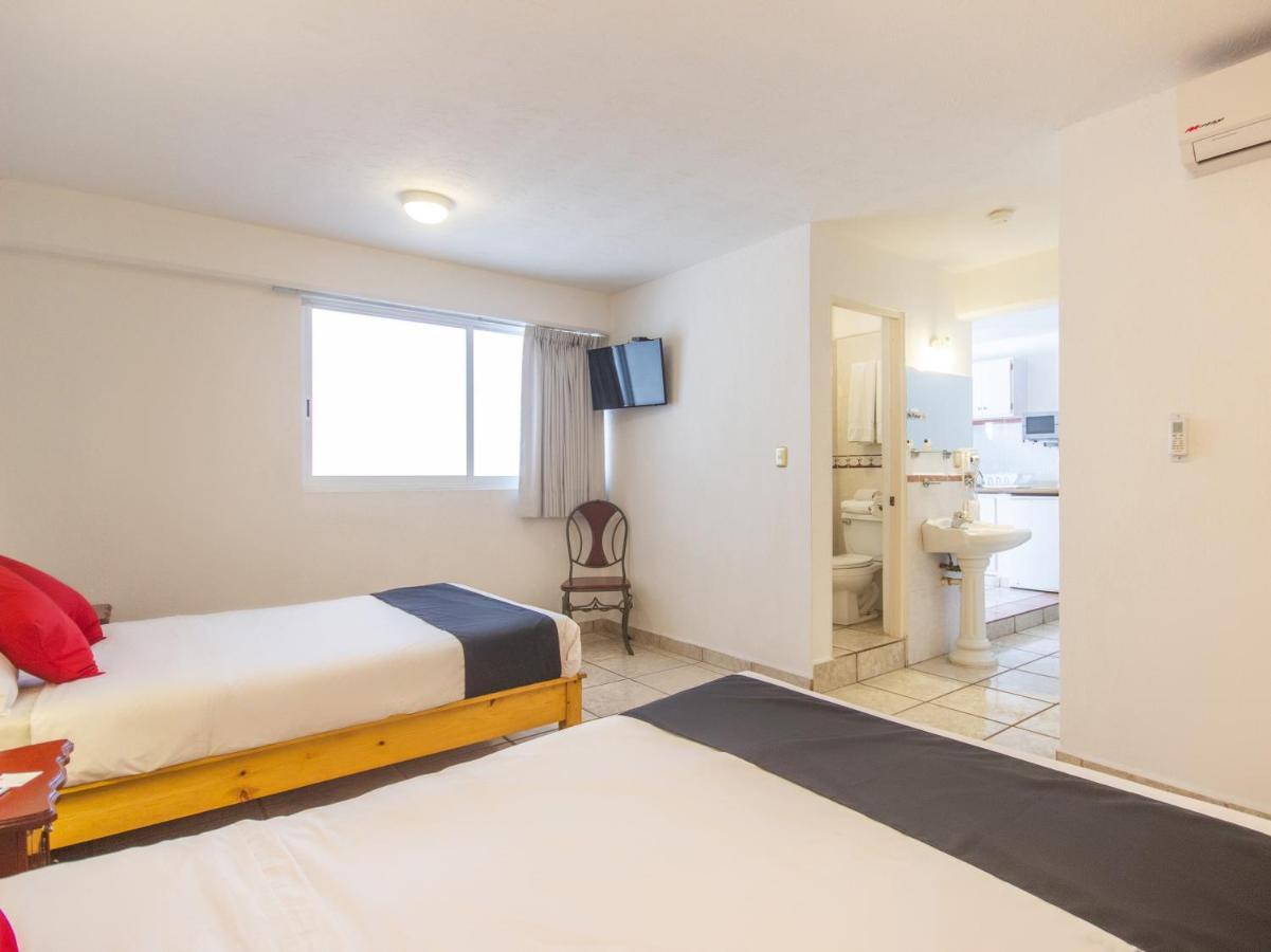 Capital O Hotel Suites Andrade ليون المظهر الخارجي الصورة
